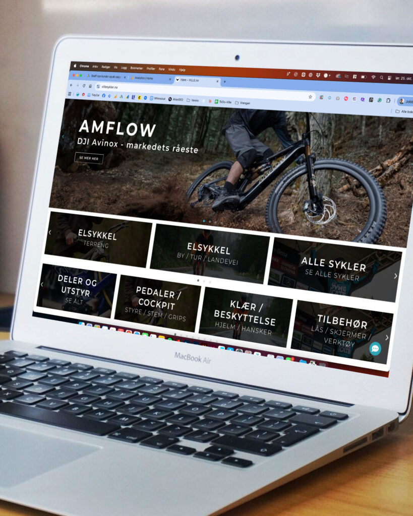 Bilde av en mackbook air som viser hjemmesiden til villesykler.no